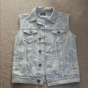 Denim oversized vest with a cross on the back